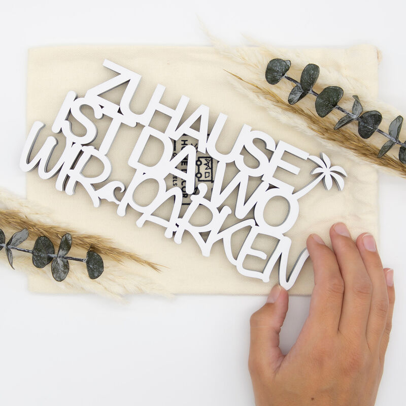 Schriftzug Zuhause weiß